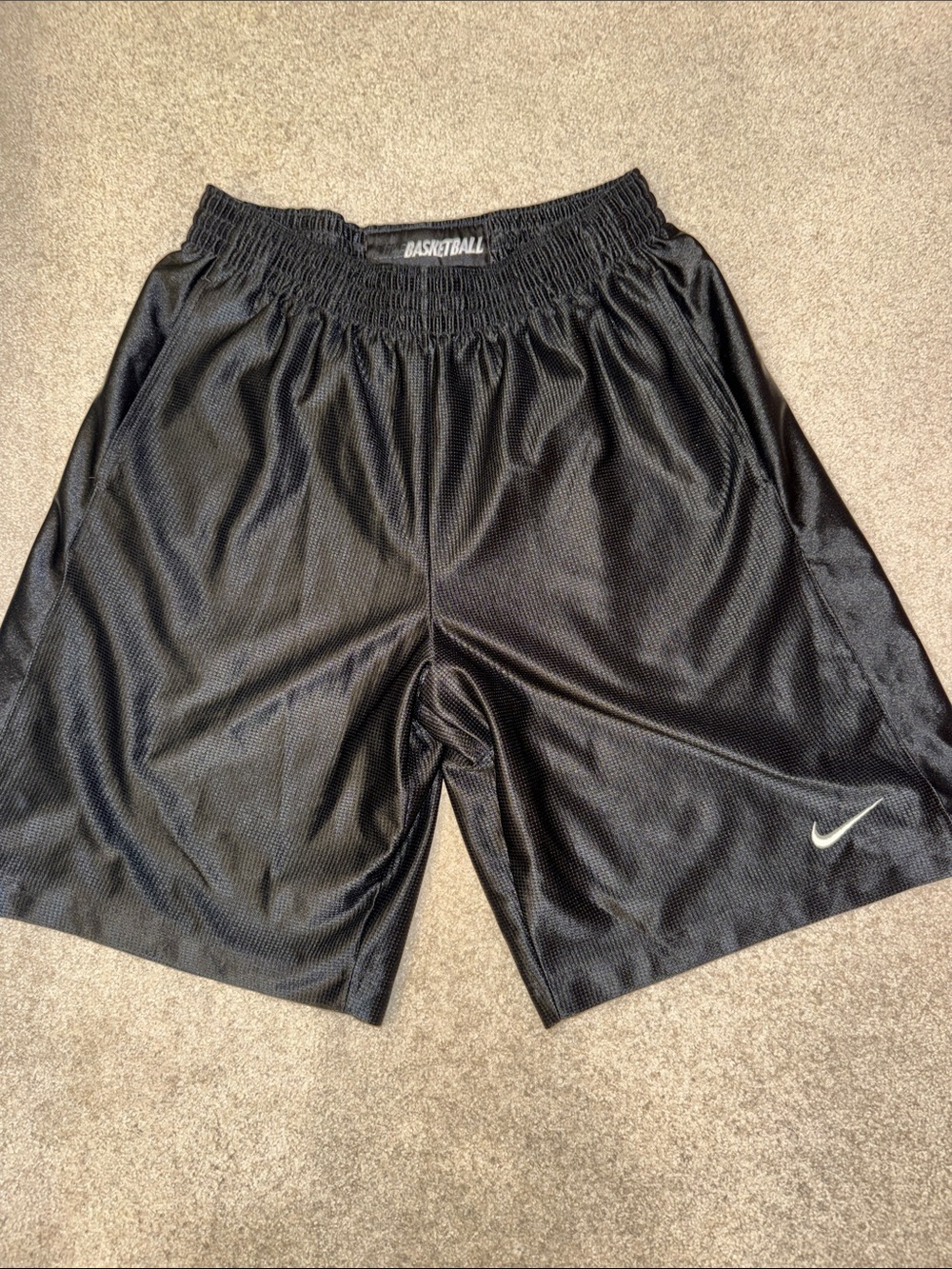 Nike Black Athletic Basketball Shorts with White Swoosh